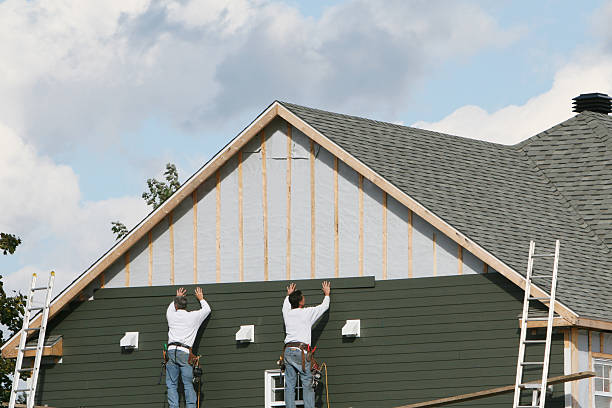 Professional Siding Repair technician working in Girard, OH